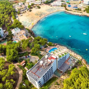 a view of Palladium hotel, Ibiza from above, with a view of Cala Llonga beach
