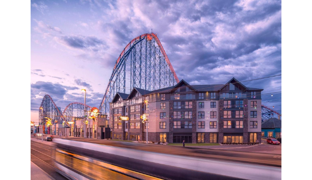 Boulevard Hotel in Blackpool with a rollercoaster in the background