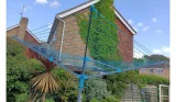 Beldray 60m rotary airer with the umbrella up
