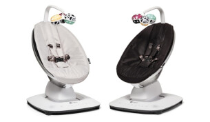 Two 4Moms MamaRoo baby swings in grey and black