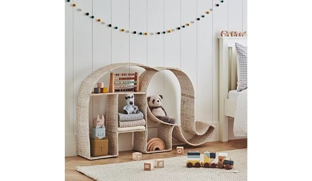 An elephant bookshelf, made using rattan.