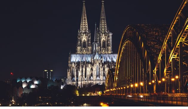 Cologne lit up at night time