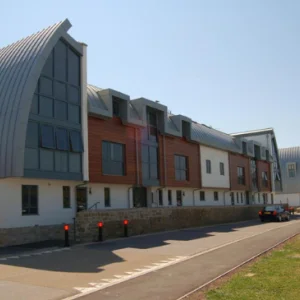 a modern apartment complex on a sunny day