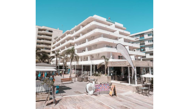 a multi-storey hotel on a sunny day