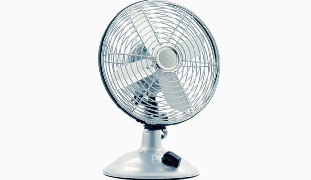 A picture of a metal desk fan.