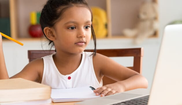 young girl learning