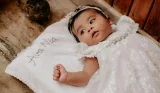Baby lying on blanket