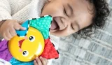 Baby with toy