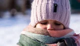 Child wearing a winter hat