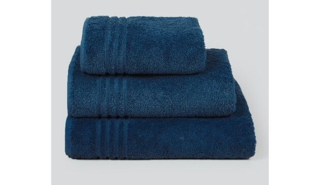 pile of green towels matalan