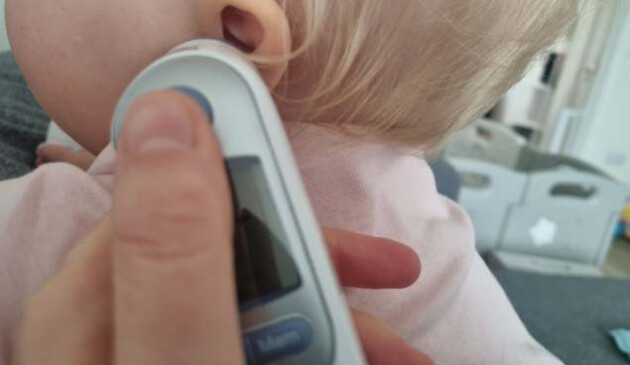 Braun ThermoScan 7 thermometer in baby's ear