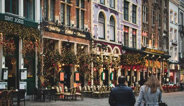 Line of classic Bruges buildings with Christmas decorations