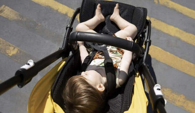 child asleep in bugaboo bee 6 pushchair
