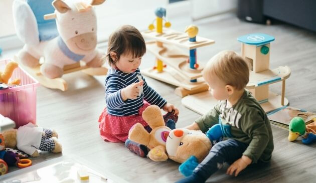 two children playing with toys