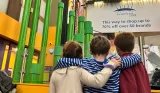 Kids getting ready to climb at Clip 'n Climb at the O2