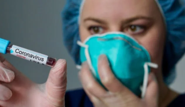 medical researcher with syringe