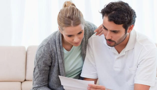 Couple Reading Letter