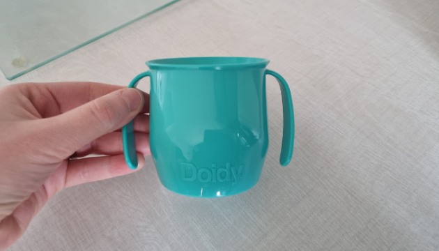 Woman holding Doidy Cup