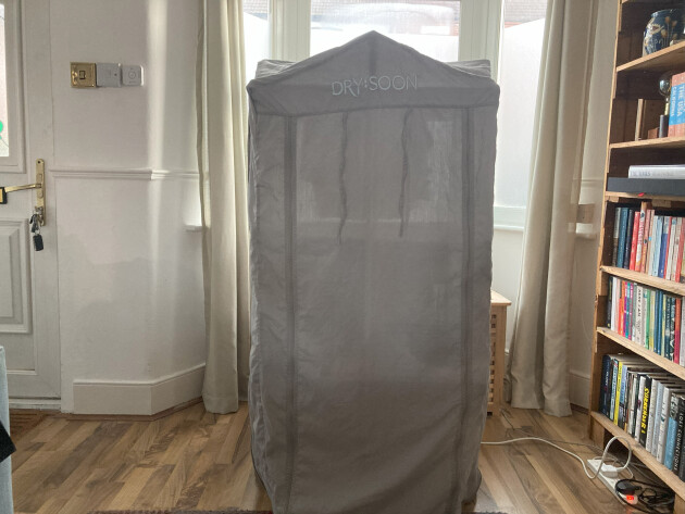Journalist Rachel Erdos hand testing the Dry:Soon three-tiered heated airer cover