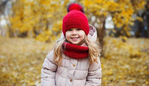 Girl in hat and coat