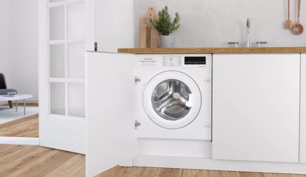 A picture of an integrated washing machine.