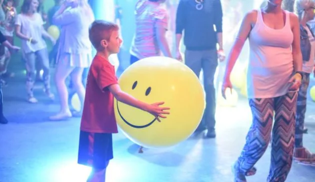 Child at a kids' club at a holiday resort.