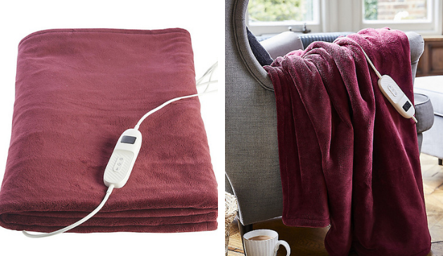 red heated throw showing controller and draped over chair