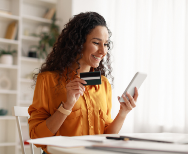 Woman online shopping using her phone