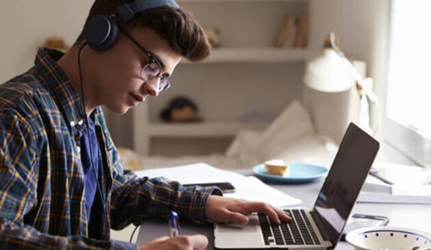 teenage boy studying