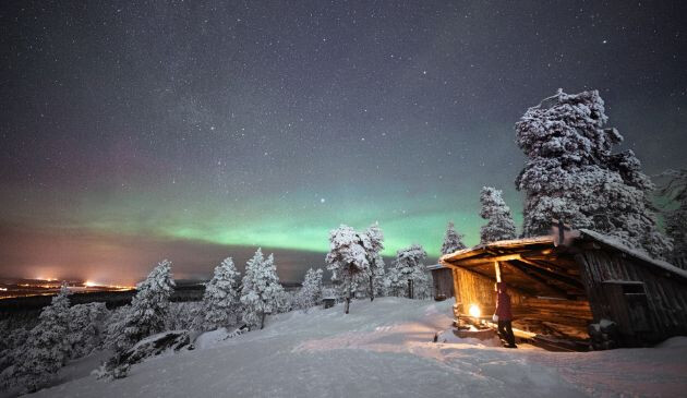 A snowy wooden lodge in Lapland