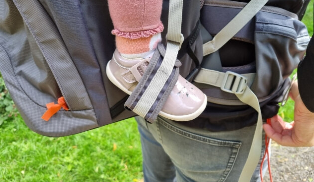 Toddler's foot in stirrup of Littlelife Cross Country S4 carrier