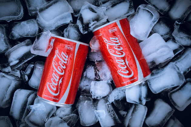 Cans of Coke in ice