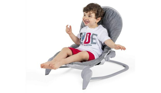 Toddler in Chicco 2-in-1 bouncer toddler chair