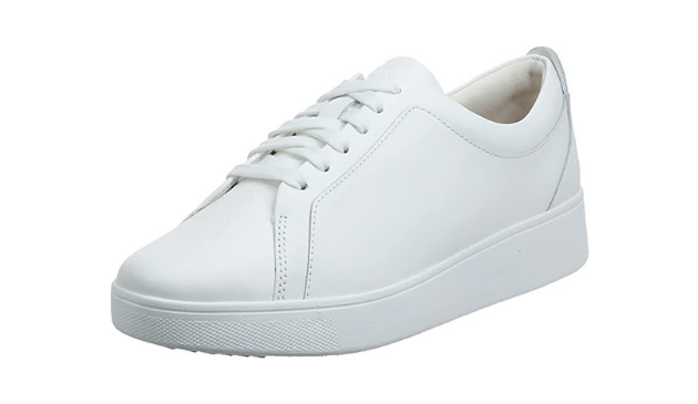 A pair of white FitFlop Rally trainers