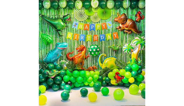 a room decorated with a dinosaur theme
