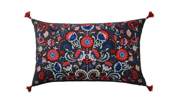 An embroidered blue, red and grey cushion from IKEA