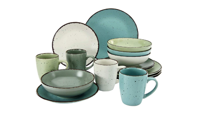 a set of green, turquoise and off-white plates, bowls and mugs