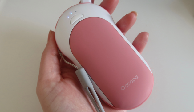 Ocoopa Hand Warmer held in a palm