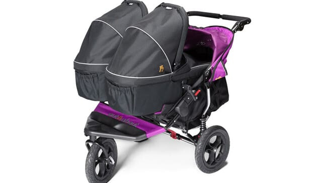 Close up view of Nipper with carry cot