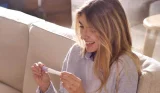 Woman taking a pregnancy test
