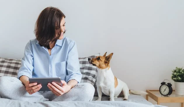 Woman wearing pyjamas in bed