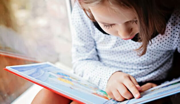 young girl learning