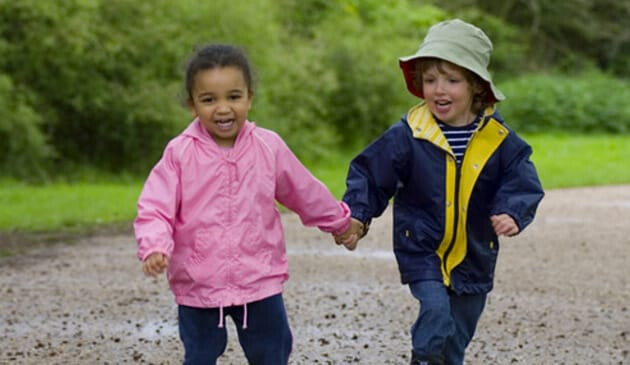 Kids running and holding hands
