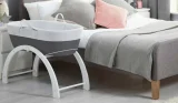 Shnuggle dreami clever sleeper set up next to bed
