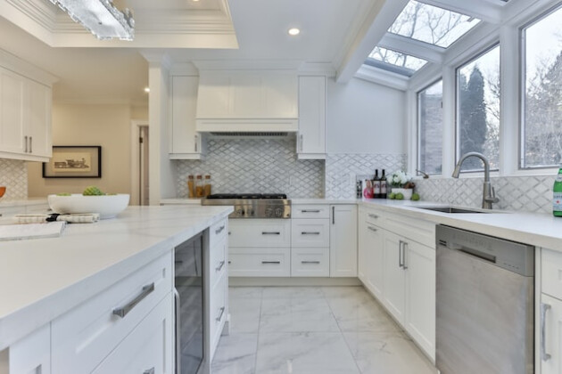 White kitchen with a tiled floor