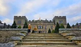 Two boys at the top of the steps at Slaley Hall Hotel