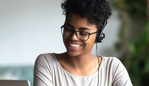 Smiling woman with headphones