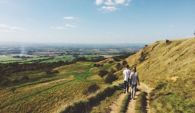 A couple walking on the Cotswold Way