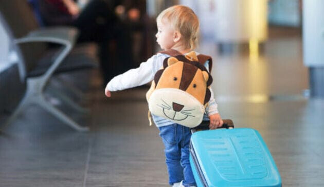 Child with suitcase
