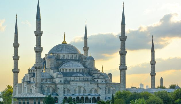 A large mosque with 5 minarets and 4 domes